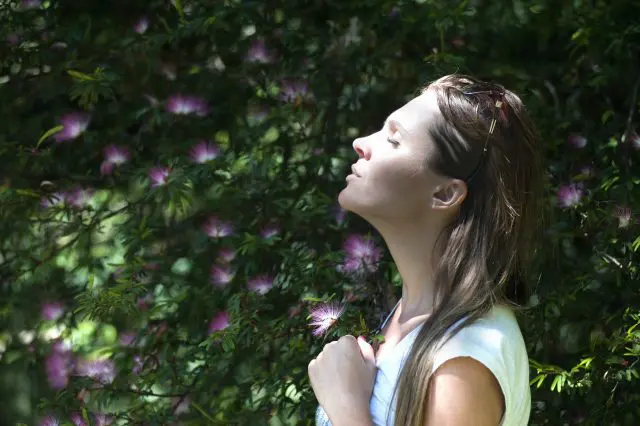Woman uses breathing techniques