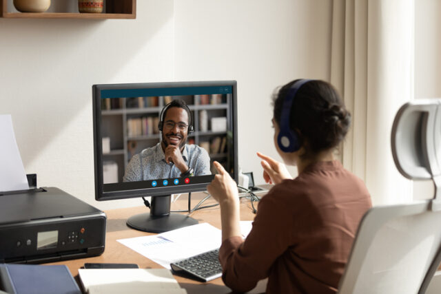 A student enjoys her accent classes on a video call.