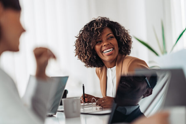 A woman enjoys her work environment.