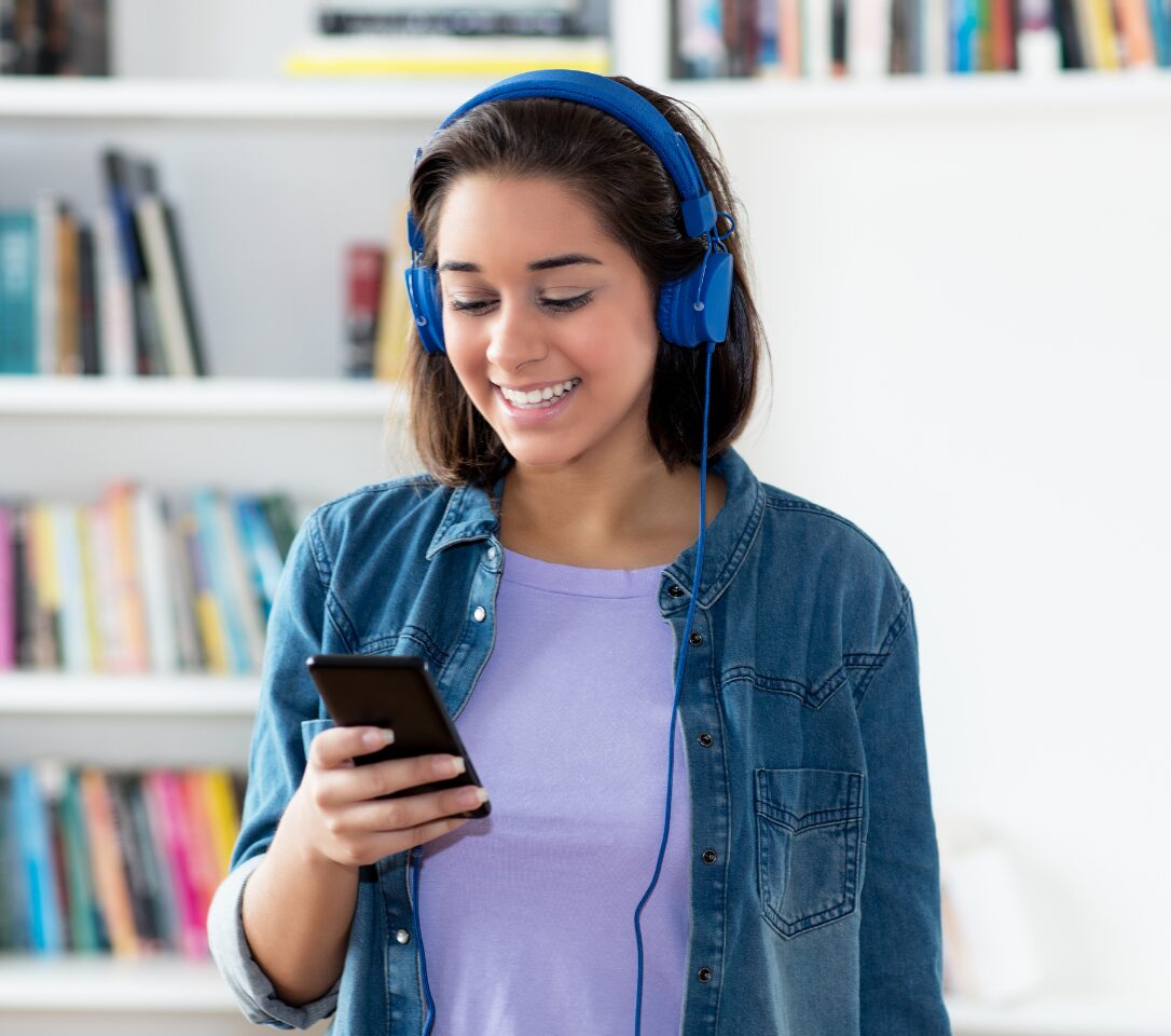 A girl listens to a podcast in the morning