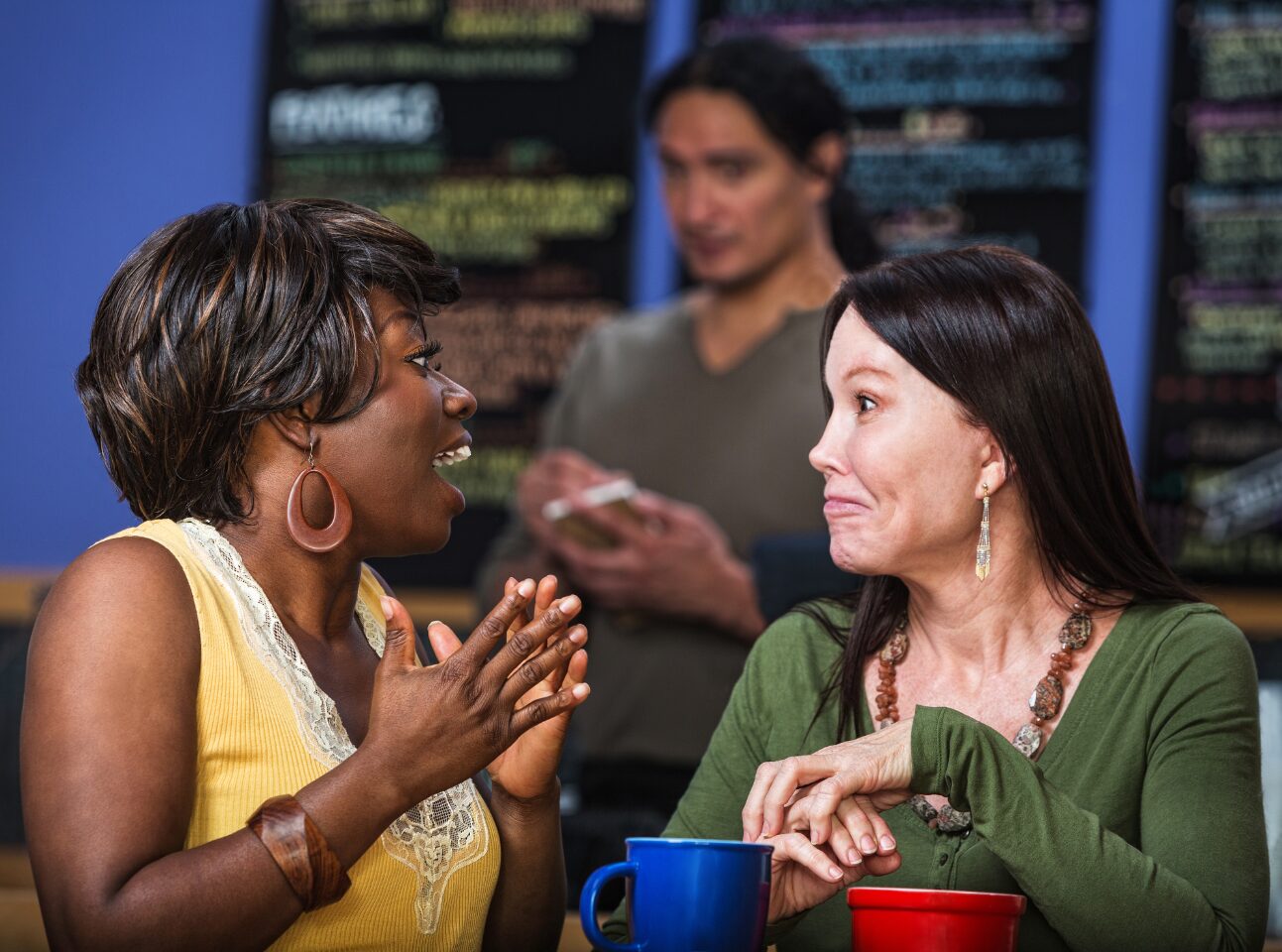 Two women express themselves freely in conversation