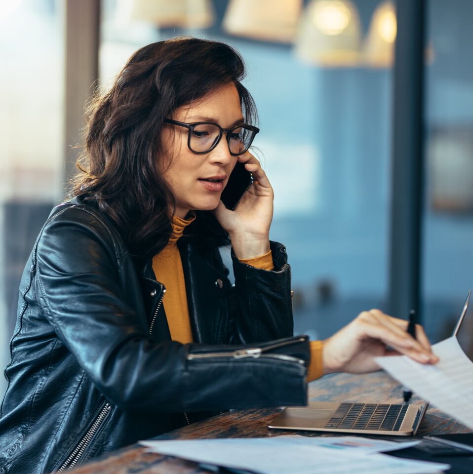 A woman is busy at work