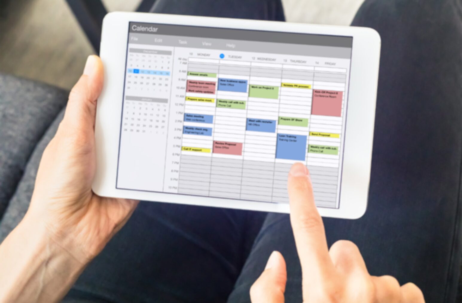 A calendar app shows a well-organized schedule.