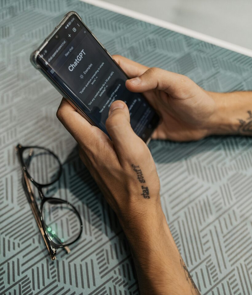 A cellphone shows the Chatgpt app